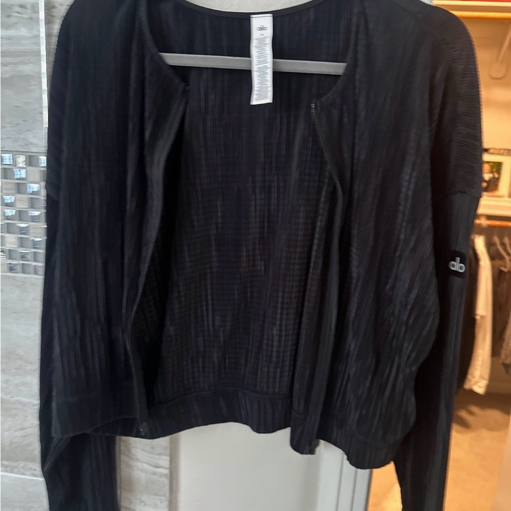 Black Micro Plisse cropped jacket. NWOT.